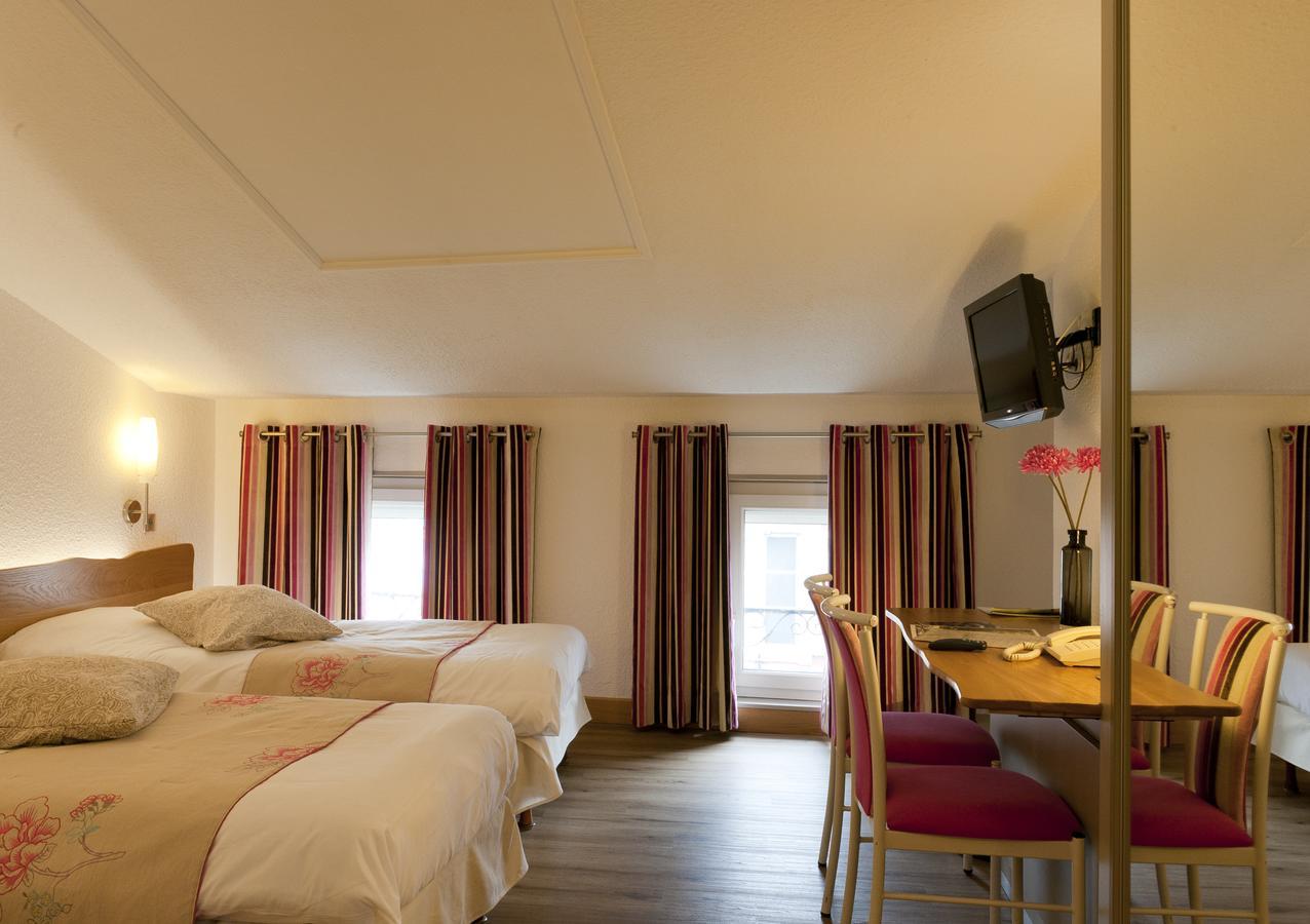 Logis Le Cheval Rouge Hotel Sainte-Menehould Quarto foto